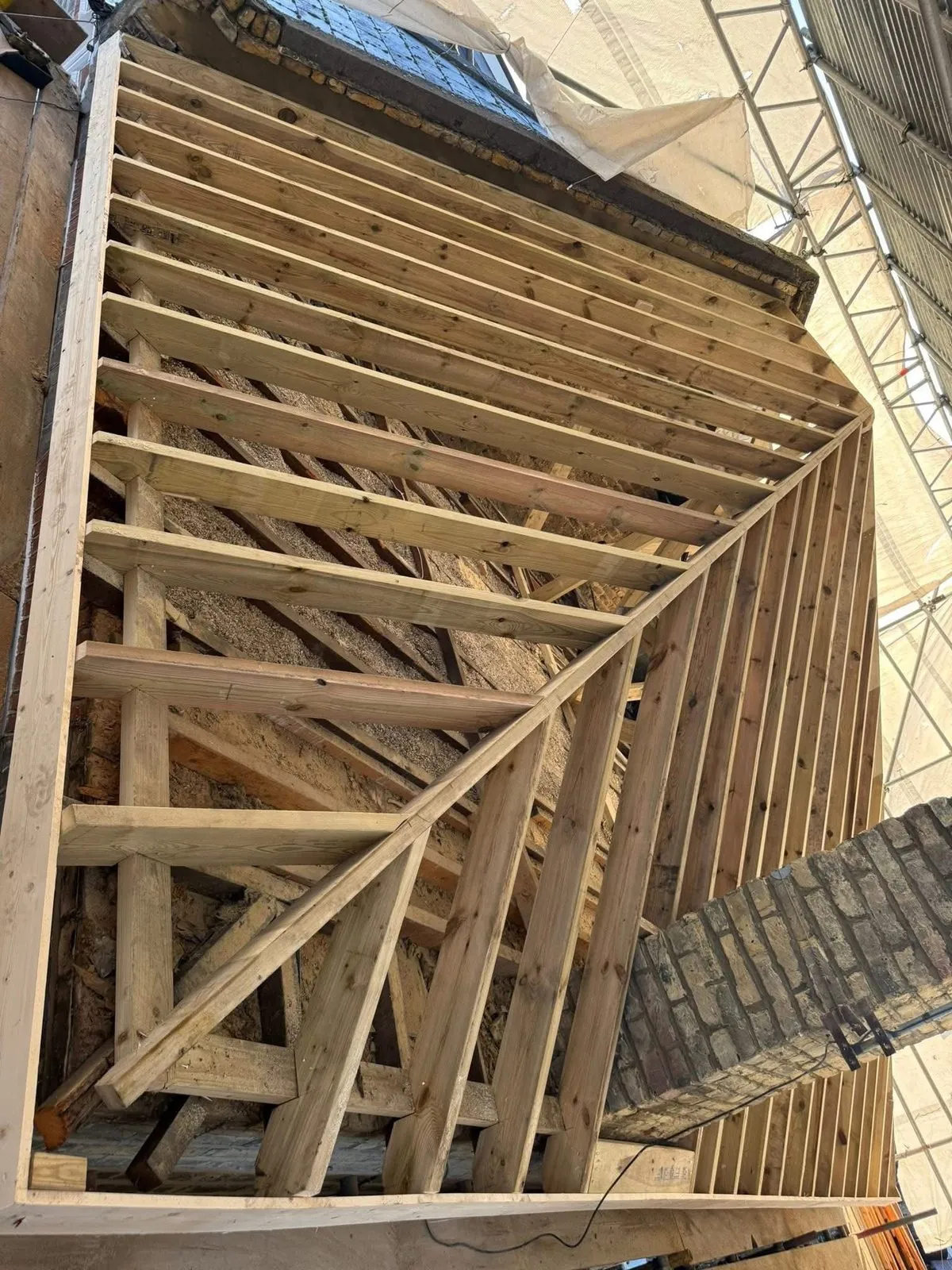 New roof timbers and rafters during a re-roof in Falmouth