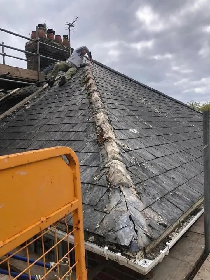 Slate roof ridge and chimney repair in Falmouth